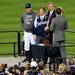 Tigers' manager Jim Leyland, owner Mike Ilitch and president David Dombrowski stand together as they wait to receive a trophy for winning the ALCS against the Yankees at Comerica Park in Detroit on Thursday. 